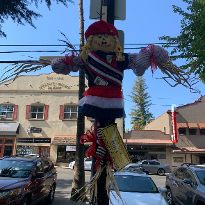 French in the Village Scarecrow